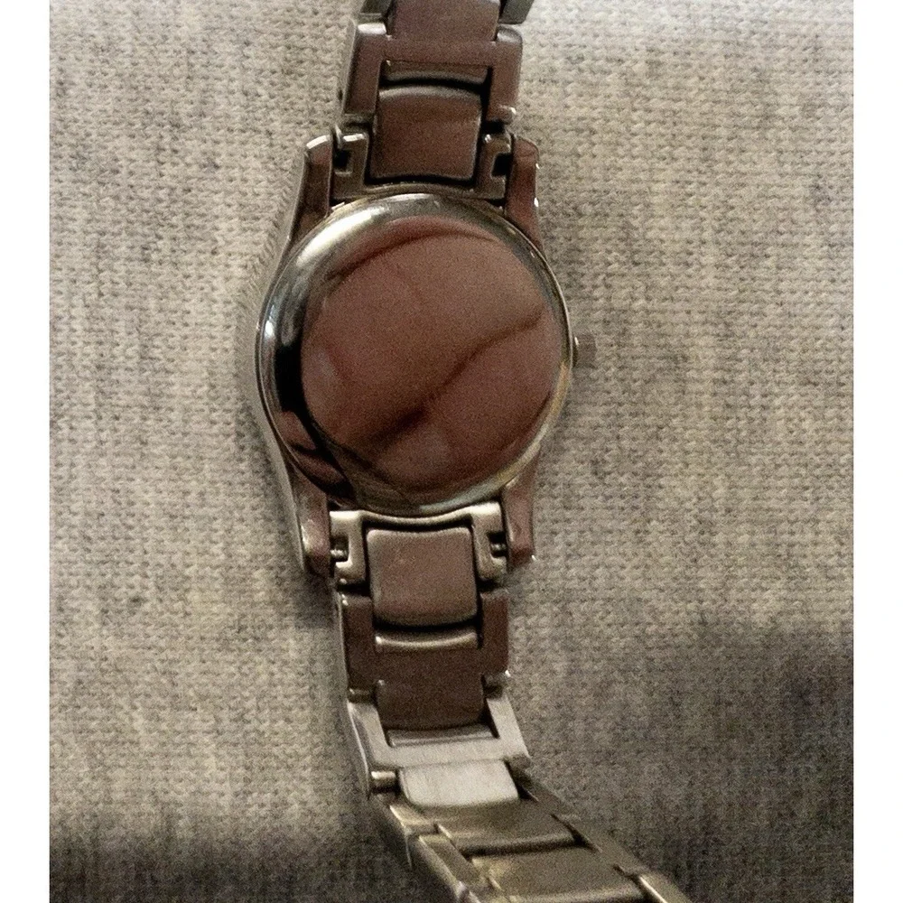 Citizen Women's Eco-Drive Silver Stainless Steel 25mm 10ATM Watch‎ E011 Movement